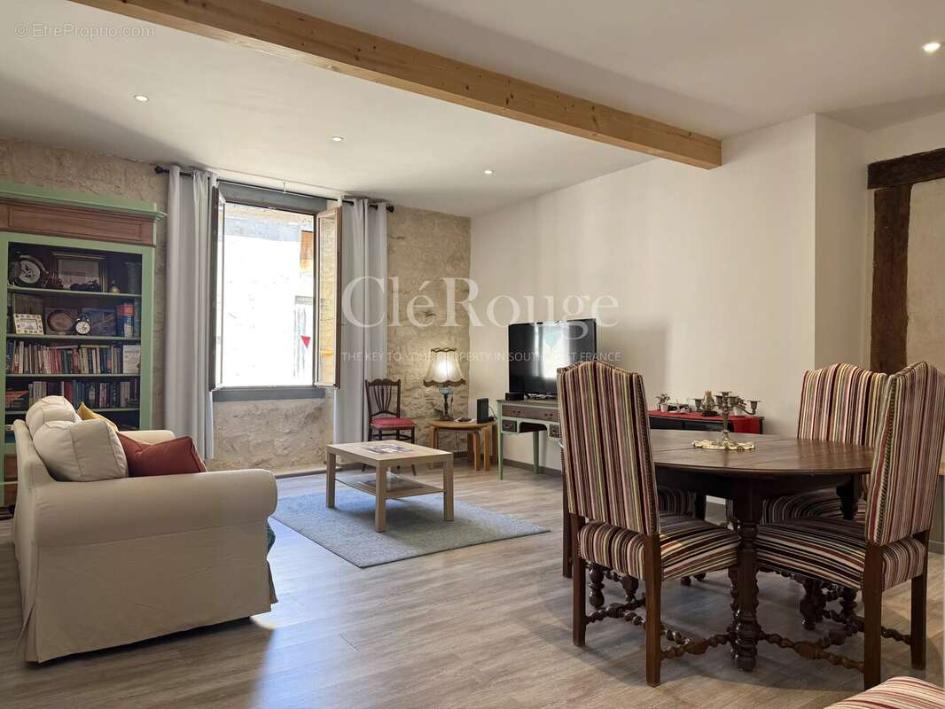 Eymet – Immeuble de rapport au cœur de la bastide avec maison, studio et local commercial - photo 7