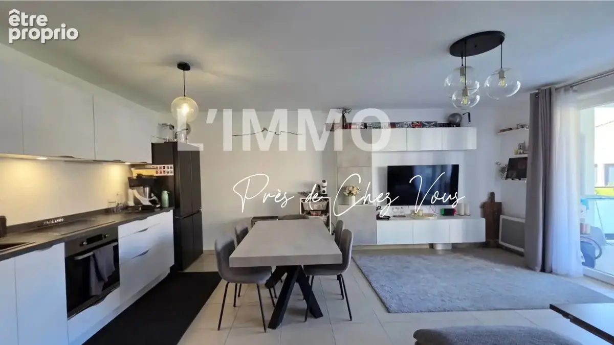 T3 67 m² avec grande terrasse, box et stationnement - photo 3