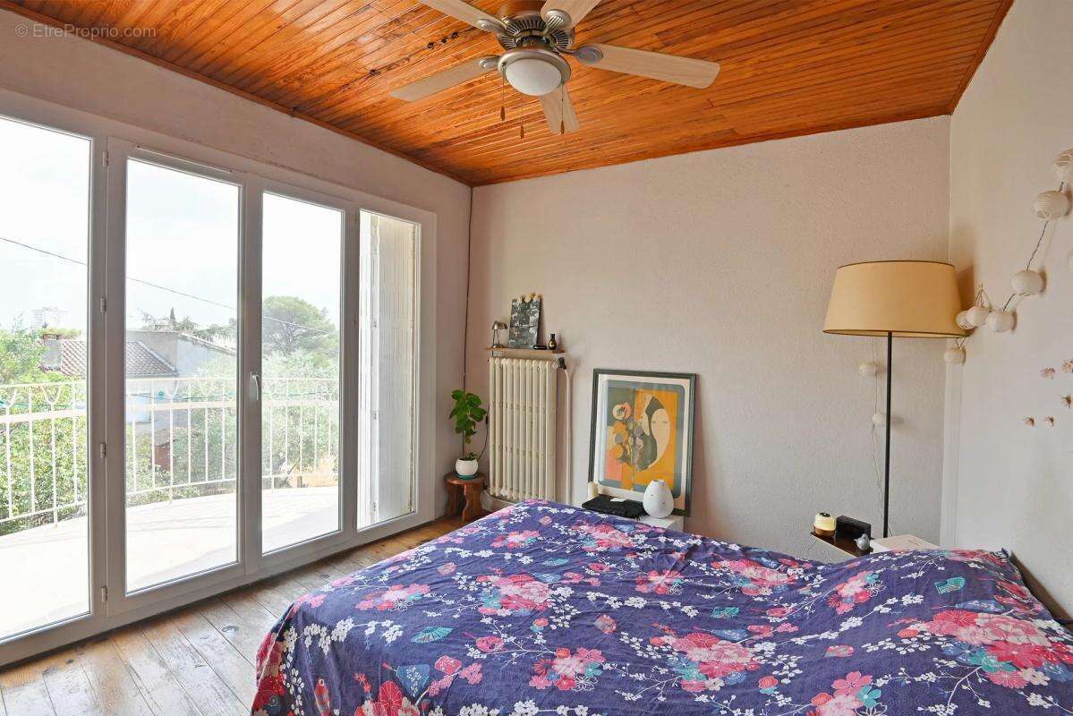 Maison de 6 pièces de 134 m² à Nîmes, Justices Vieilles - photo 9