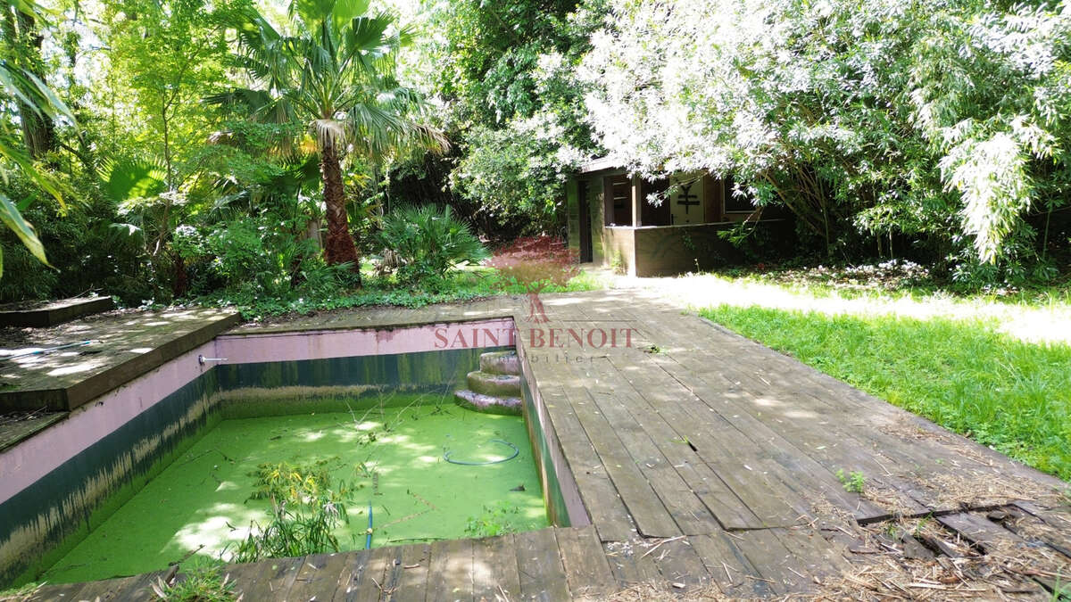 Maison de type t3 sur 2 niveaux et un appartement de type t2 sur une parcelle arboree de 6069m2 avec un bassin - photo 36