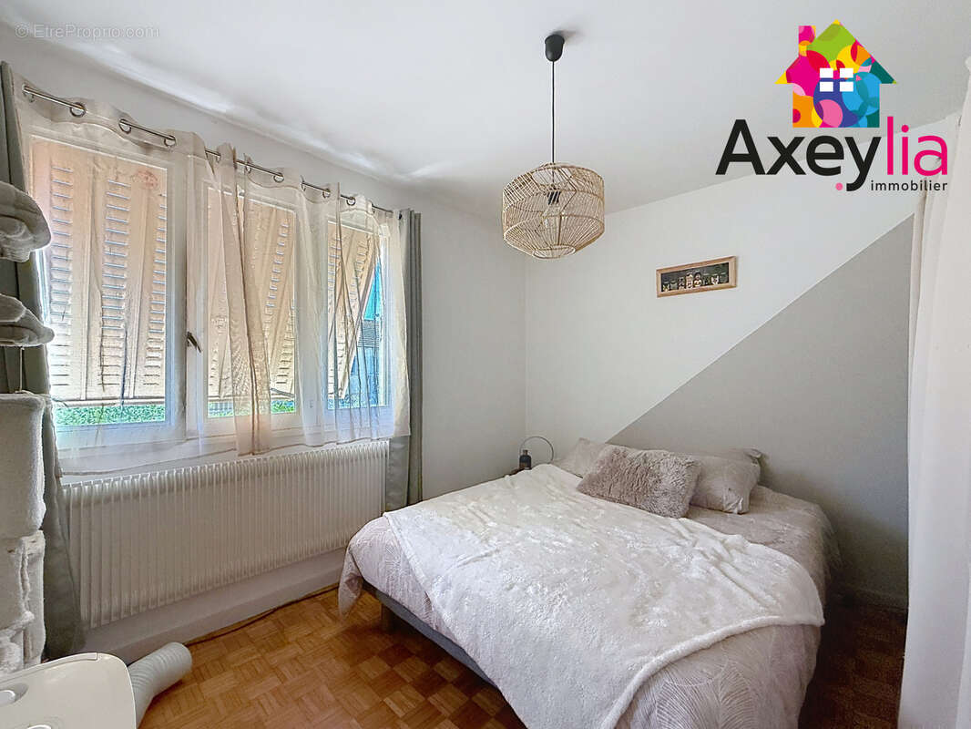 A vendre - mably - maison louée élevée sur sous-sol avec deux chambres, garage et terrain - photo 9