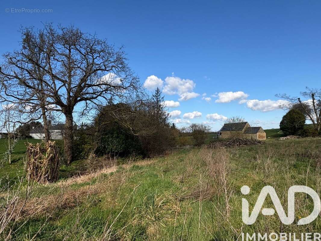 Photo 2 - Terrain à CAOUENNEC-LANVEZEAC