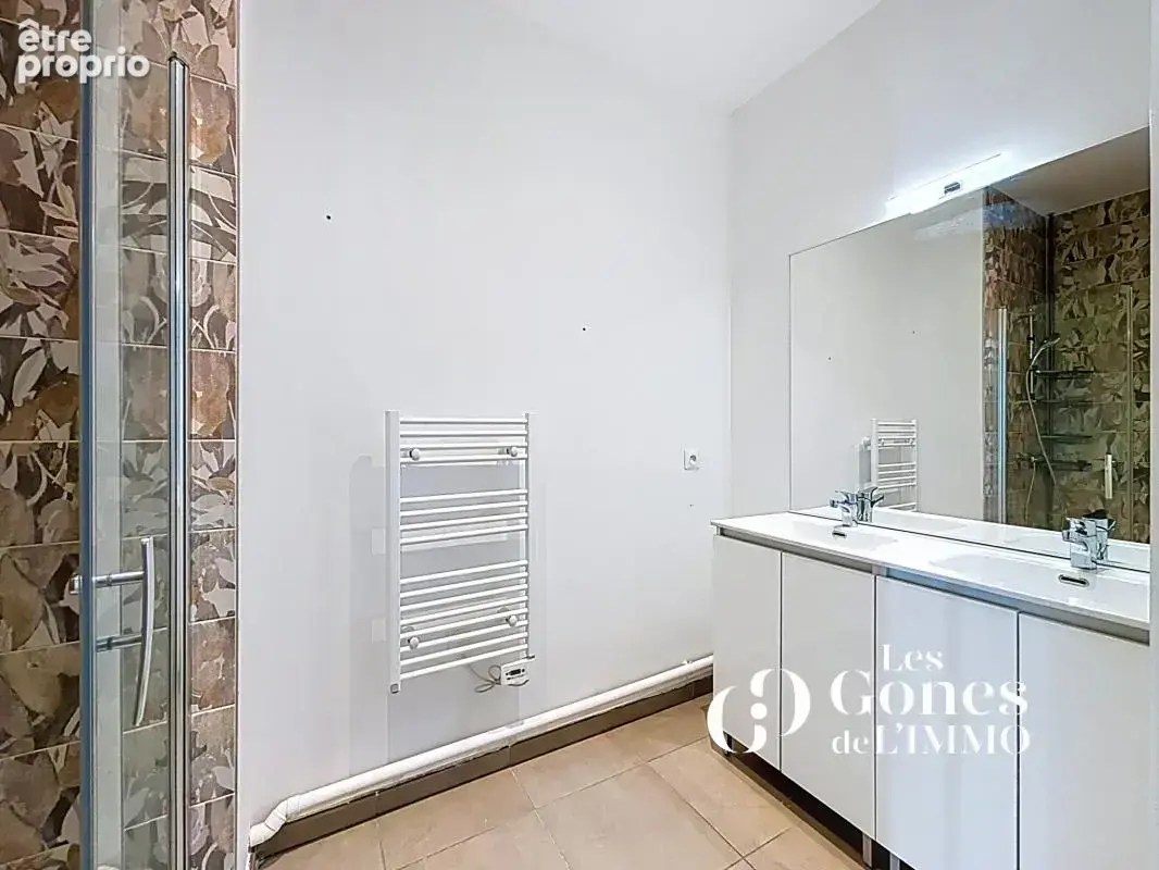 CRAPONNE   Un duplex familial de 102 m2 avec 3 chambres et d - photo 11