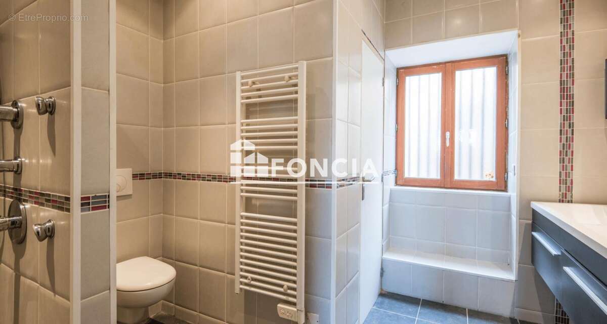 Esprit loft pour ce 3 pièces quartier Faubourg - photo 4