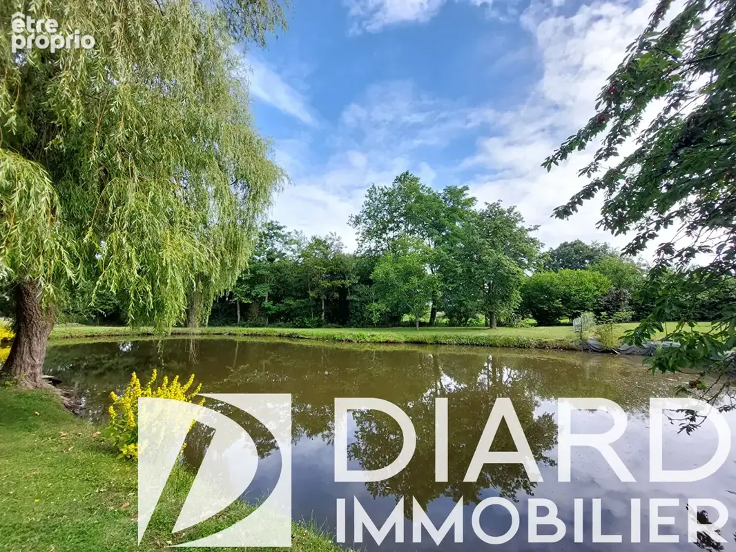 Propriété 201 m² , dépendances et plan d'eau - photo 15