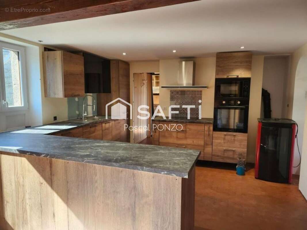Maison 120 m² à Saint-Yrieix-Les-Bois  - photo 6