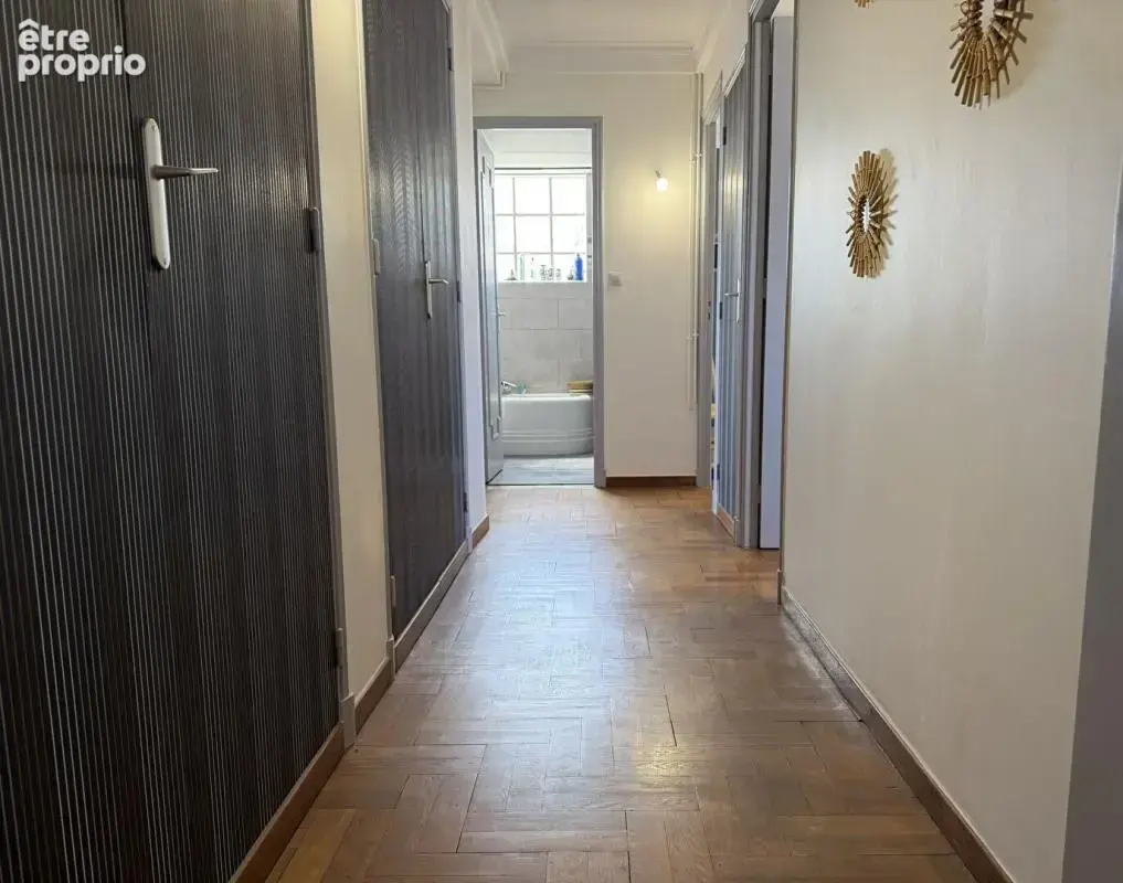 Appartement traversant de 103 m² avec terrasse garage parquets proche centre-ville et canal - photo 10