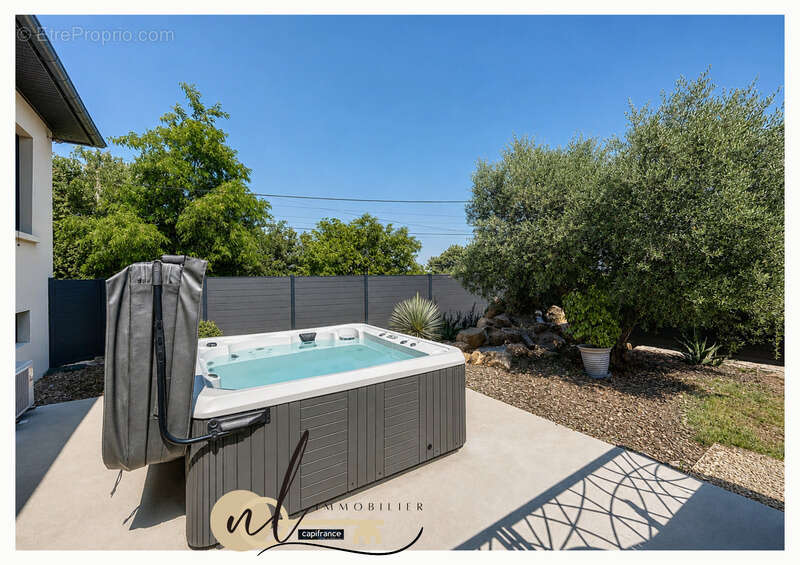 SOLEYMIEU – Maison 5 pièces entièrement rénovée avec vue dégagée, SPA, dépendance et possibilité d’espace professionnel indépend - photo 5