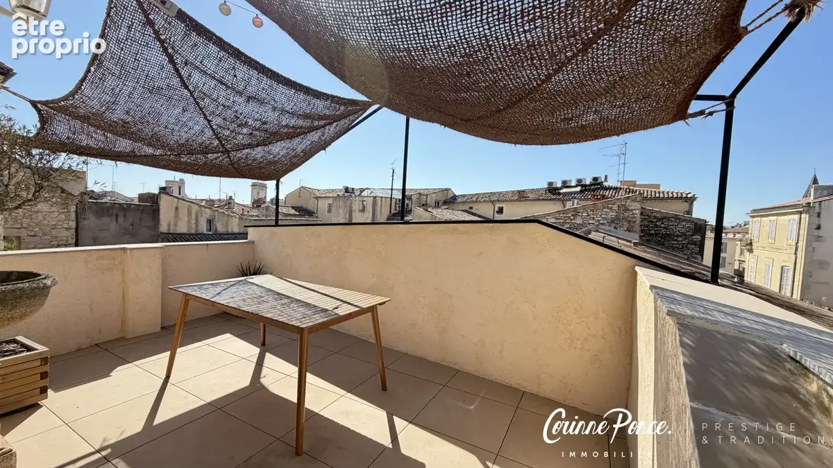Nimes centre appartement / maison de ville  141 m2 avec garage et terrasse en rooftop propose par corinne ponc - photo 13