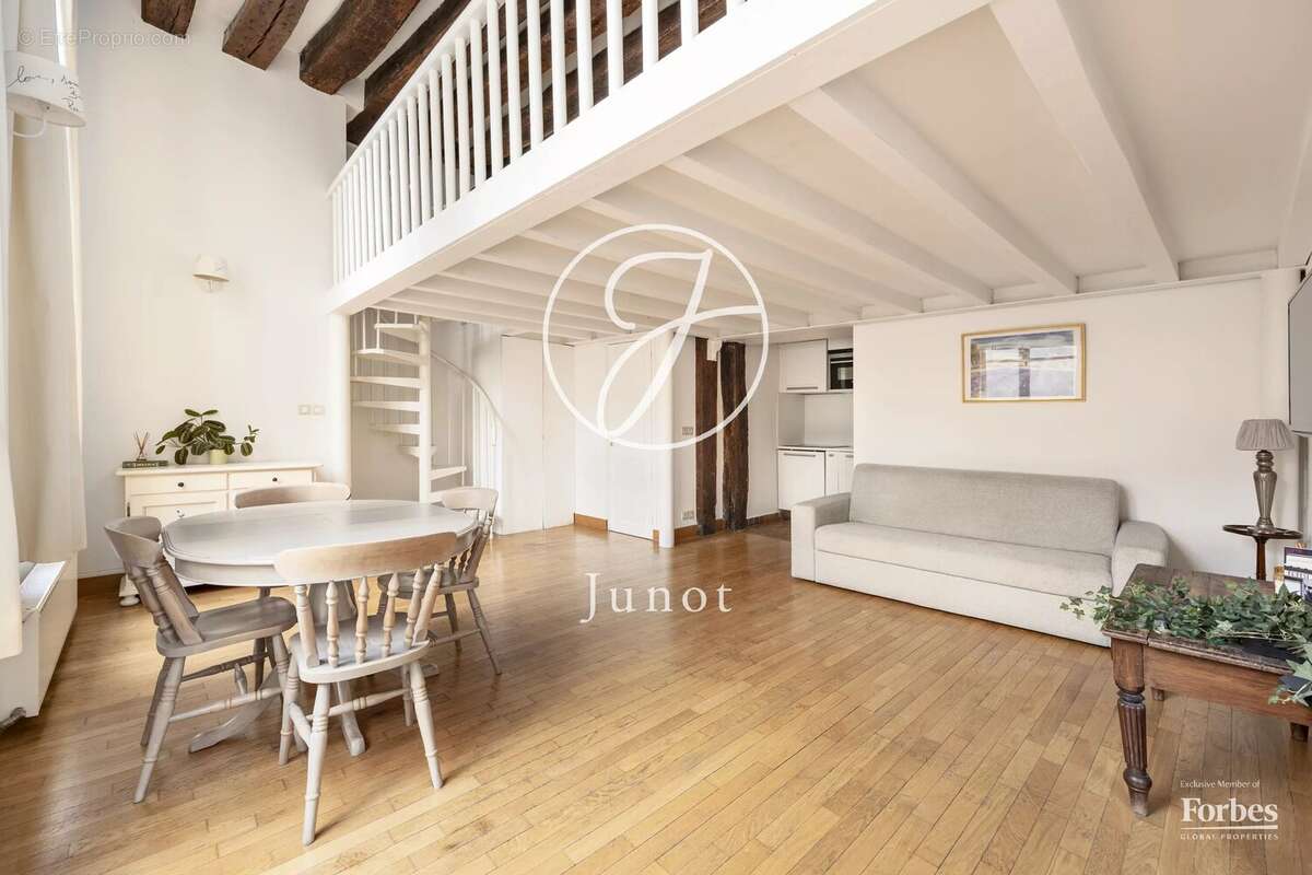 Paris 4e – QUINCAMPOIX – Appartement - 2 pièces  - 34,49m² Carrez - 49,94m² au sol. - photo 2