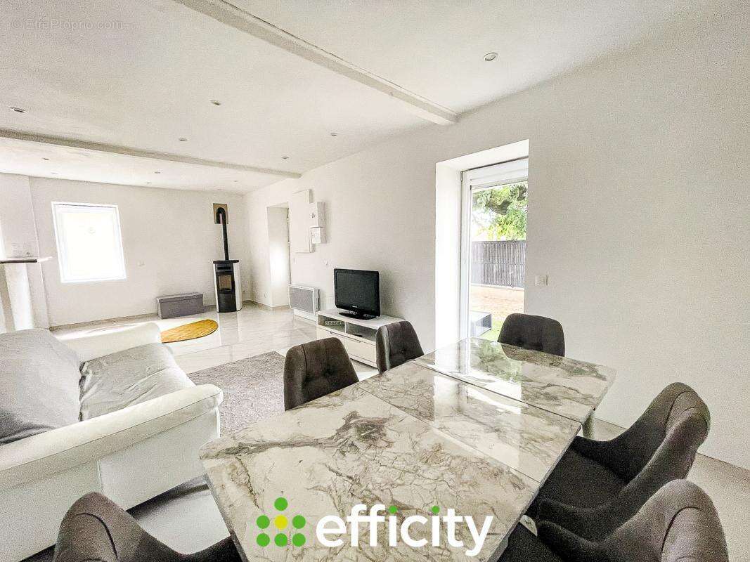 Maison 100 m² à Saint-Romain-De-Jalionas  - photo 2