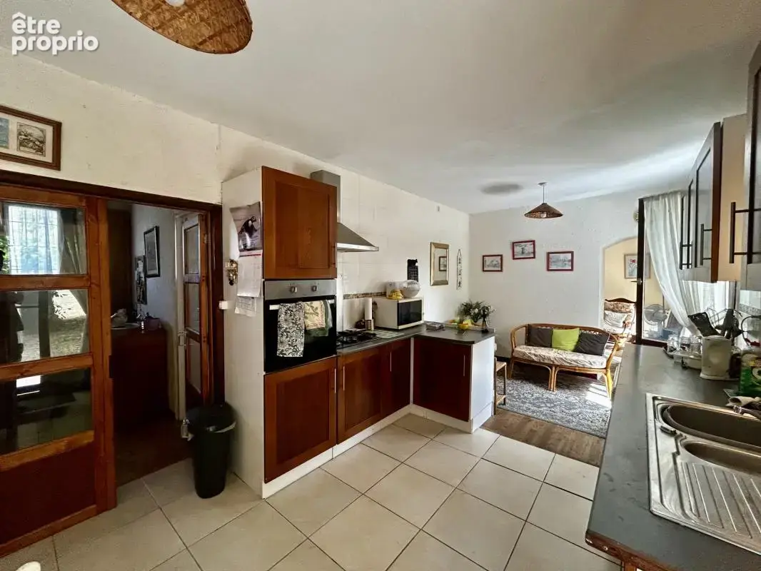 Maison de caractère de 190m2 avec terrain et beau potentiel - photo 4