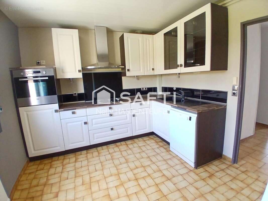 Photo 2 - Maison à QUIEVRECHAIN