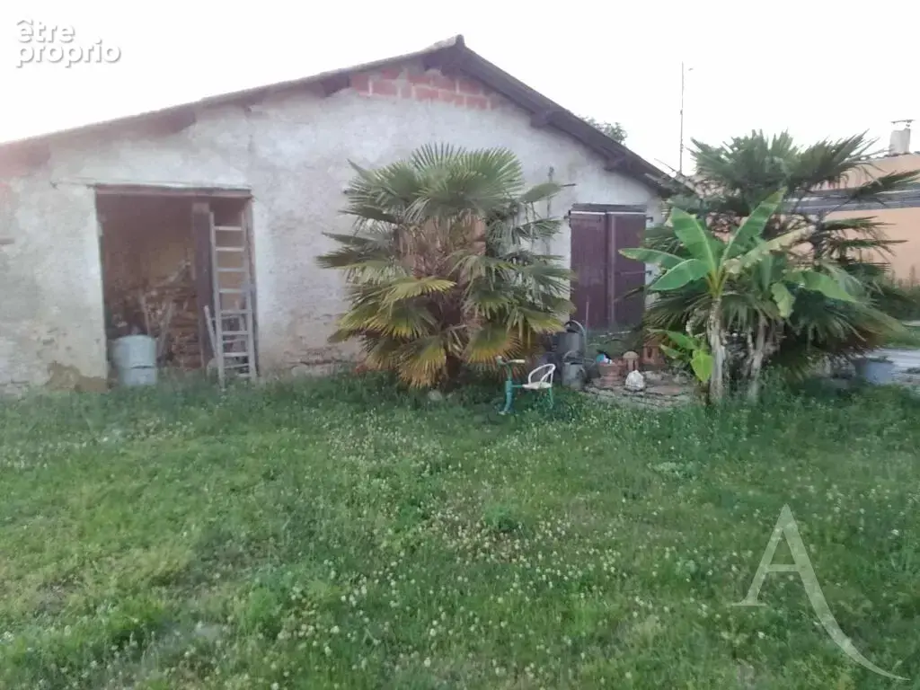 Bâtiment de 60m² sur 335m² de terrain - photo 1