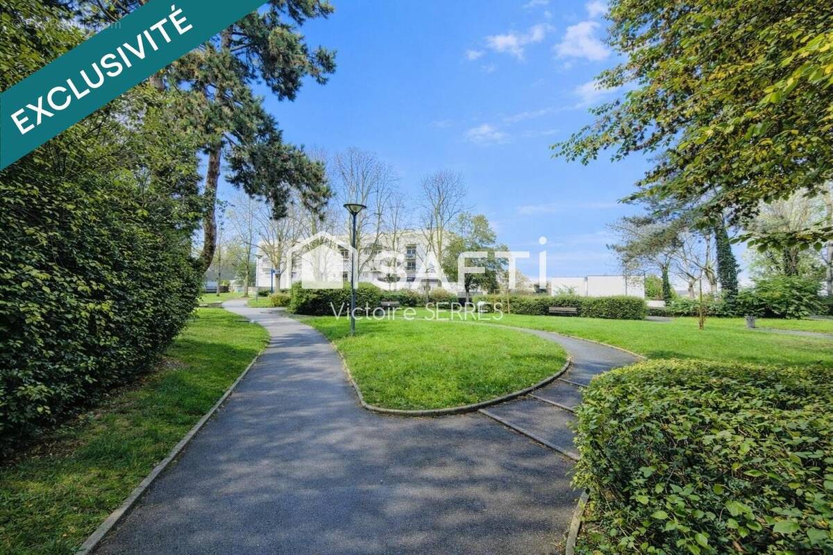 Photo 1 - Appartement à HEROUVILLE-SAINT-CLAIR