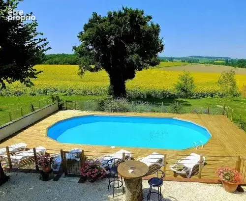 Superbe grange réaménagée avec 6 chambres et 4 salles de bains, offrant une vue imprenable - photo 2