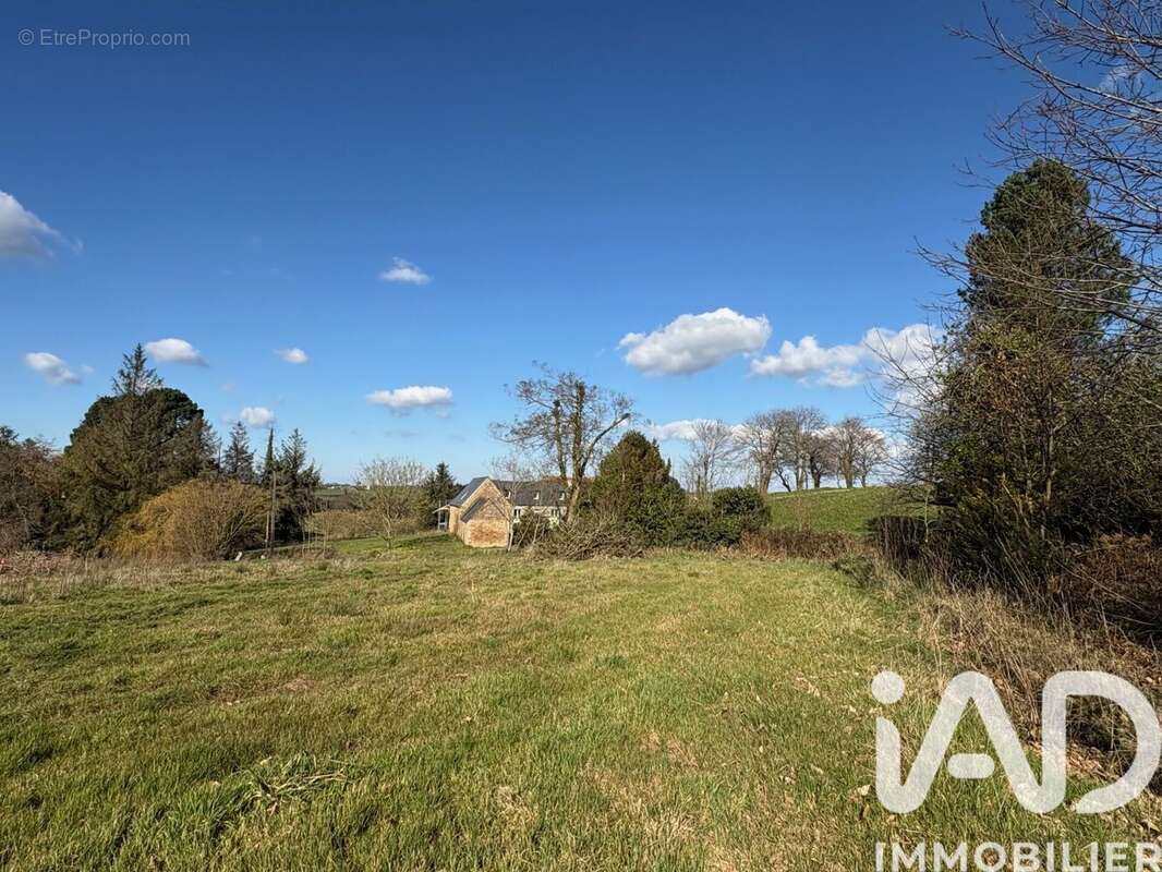 Photo 2 - Terrain à CAOUENNEC-LANVEZEAC