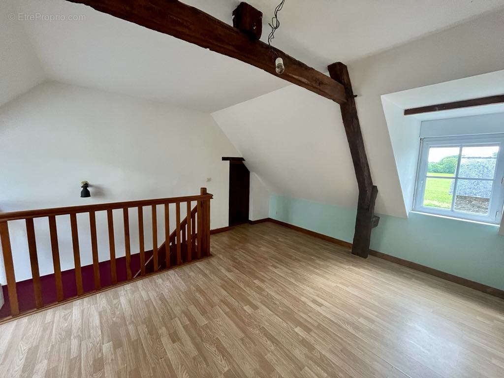 Maison à JUVIGNE