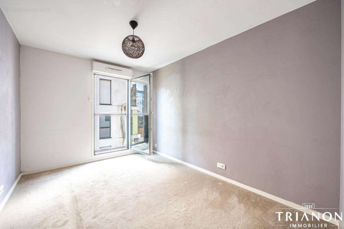 Appartement 68 m2  Asnières / 3 pièces -2 chambres  - Balcon- 2 places parking - photo 13