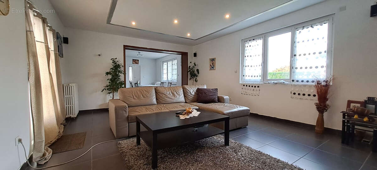 Maison à DAMIGNY