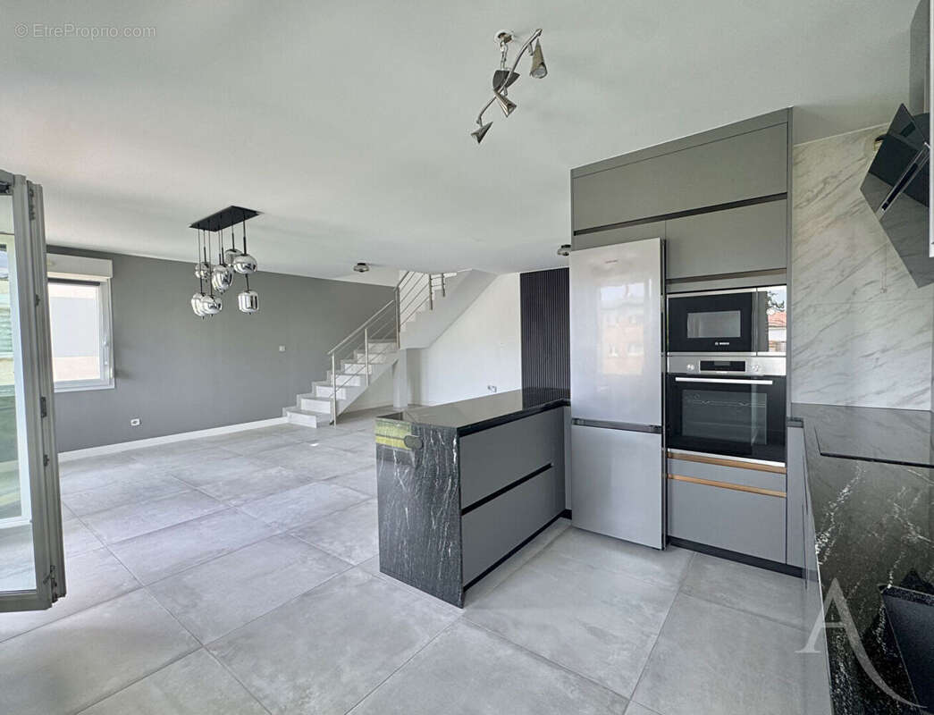 Magnifique Duplex T3 de 85,15 m² avec son garage + son parking + sa cave - photo 2