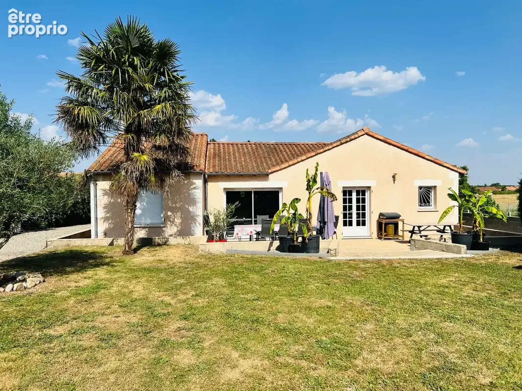 maison 2010 Plain pied - 4 chambres -garage et grand jardin - photo 3