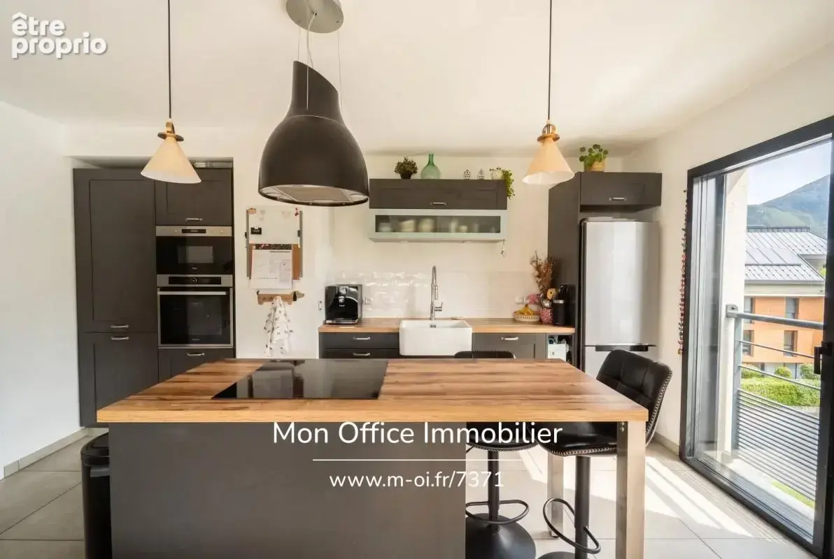 Référence : 7371-TCA - Appartement 4 pièces de 85m2 avec terrasse vue montagne et garage double rue Louis Boch (Annecy centre-vi - photo 3