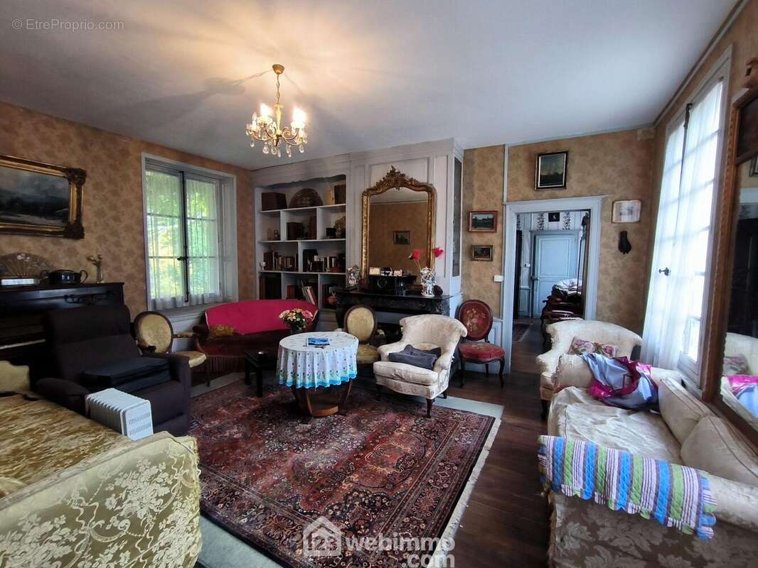 Un premier salon de 23 m², en prolongement... - Maison à BRAINE