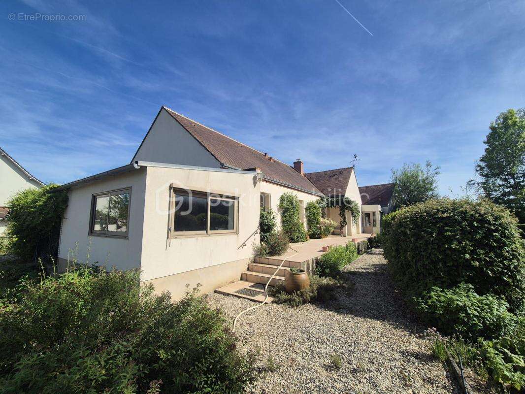 Maison de plain-pied de 124 m² - photo 3