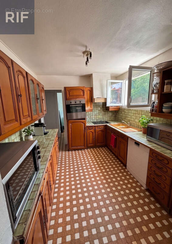 Appartement en Rez de Chaussée - photo 4