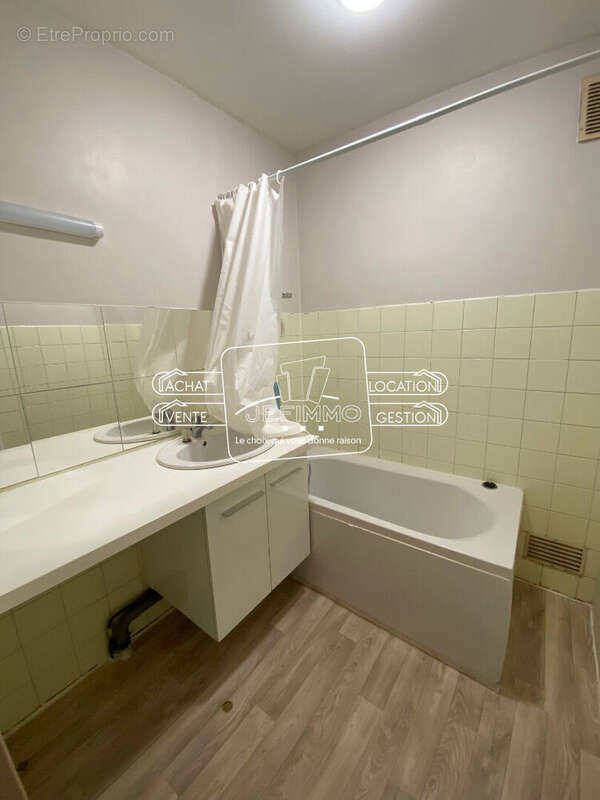 Spacieux t2 avec balcon - cave et parking - photo 9