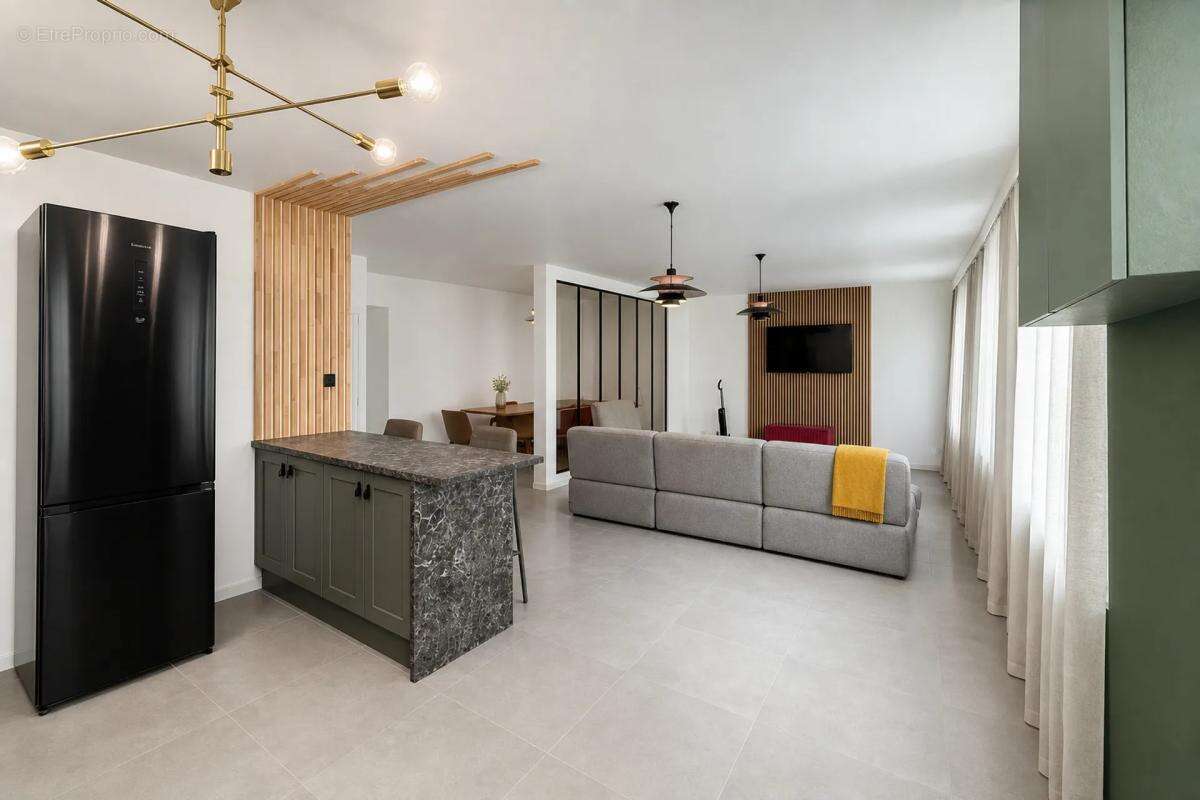 Appartement de 4 pièces de 109 m² à Saint-Étienne - photo 3
