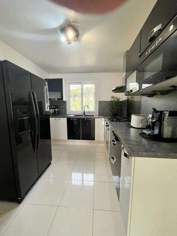Maison de 7 pièces de 150 m² à Saint-Brice - photo 6