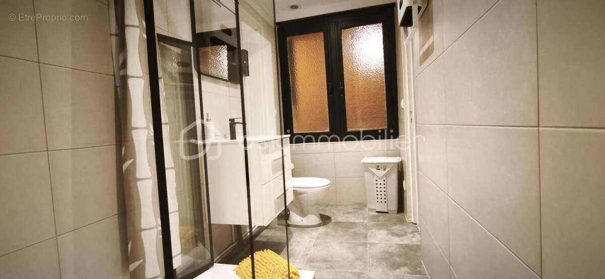 Investissement locatif- un local commercial- 2 appartements- 1 studio - 1 cave- entièrement meublé - photo 8