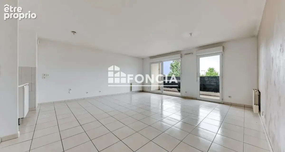 VAULX-EN-VELIN – T3 de 64 m² avec balcon et garage en résidence sécurisée de 2010 - photo 2