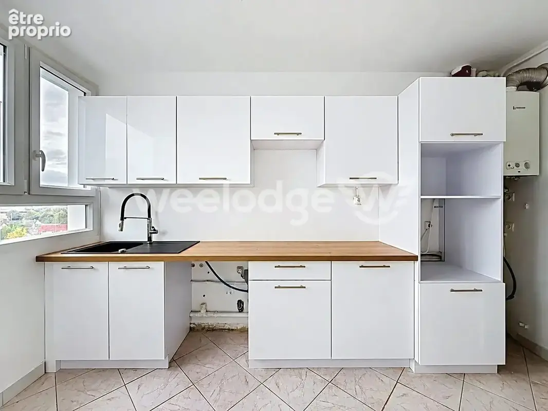 Appartement 3 pièces 64 m² à vendre à Les Clayes-Sous-Bois (78340) - photo 2