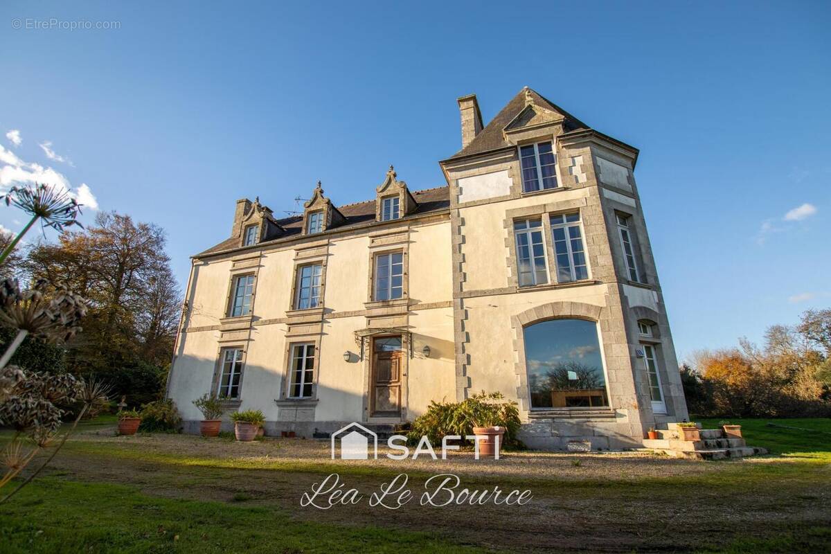 Photo 1 - Maison à PLUGUFFAN