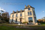 Photo 1 - Maison à PLUGUFFAN