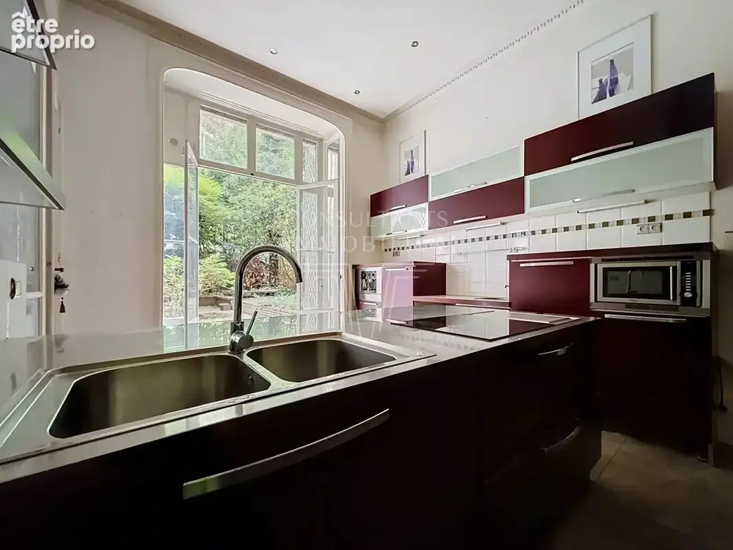 Place victor hugo/boissiere. appartement aux superbes volumes - photo 8