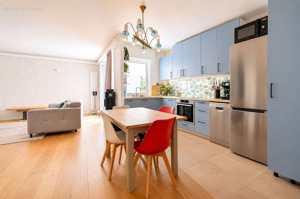 Appartement Paris 3 pièce(s) 65 m2 - photo 2