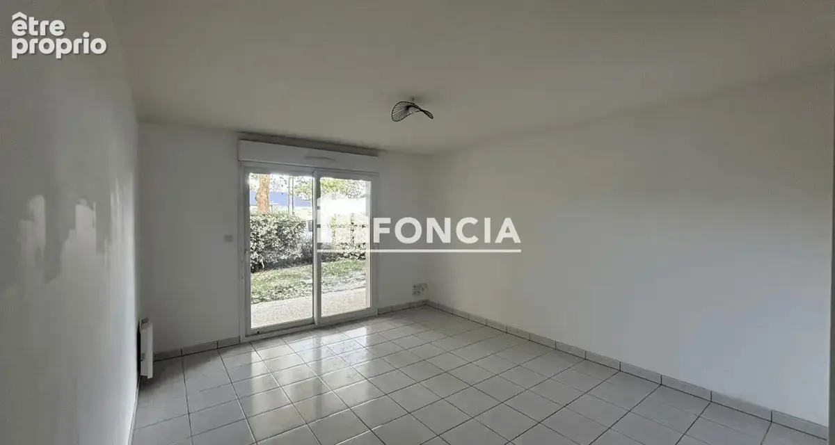 APPARTEMENT T2 en RDC avec parking et cave - photo 2