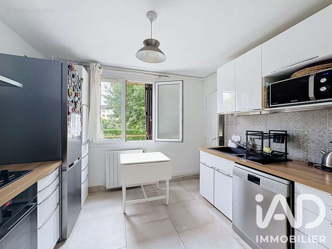Photo 6 - Appartement à LE MESNIL-LE-ROI