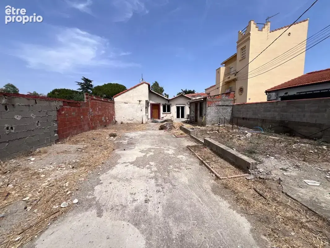 Maison de plain-pied de 95 m² environs avec travaux à prévoir sur un terrain de 509 m² proche de l'aéroport - photo 1