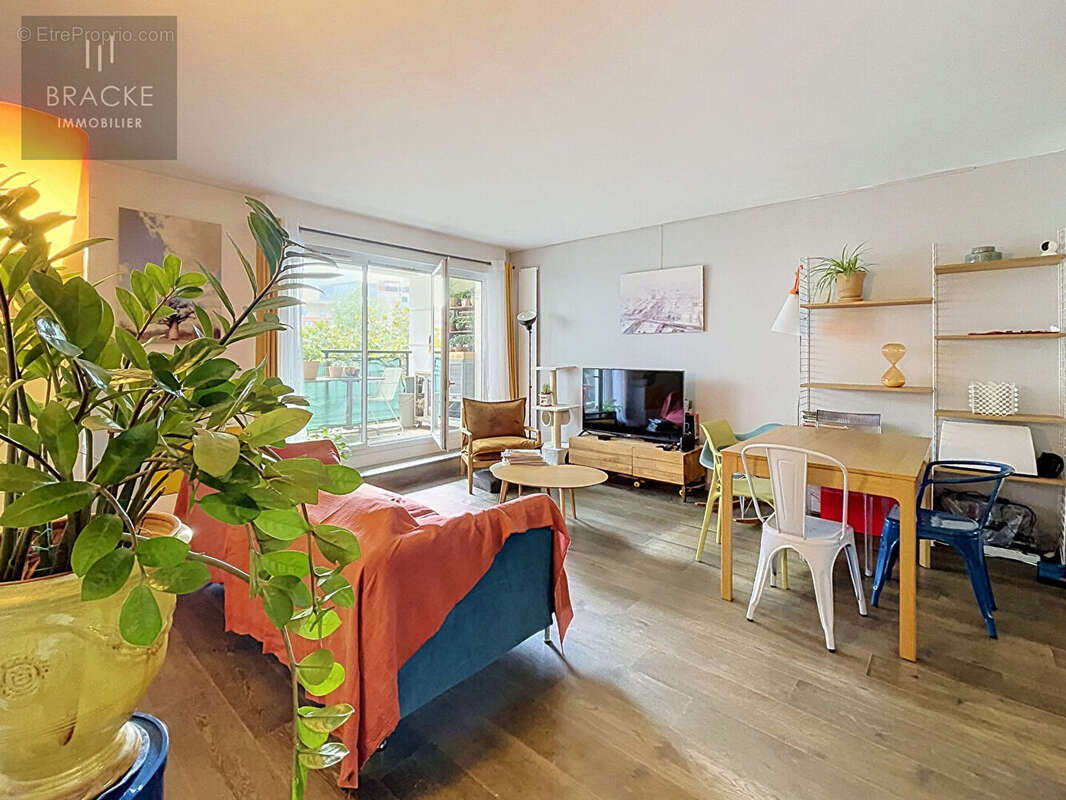 Appartement Courbevoie  Faubourg  4 pièces 75 m² - photo 4
