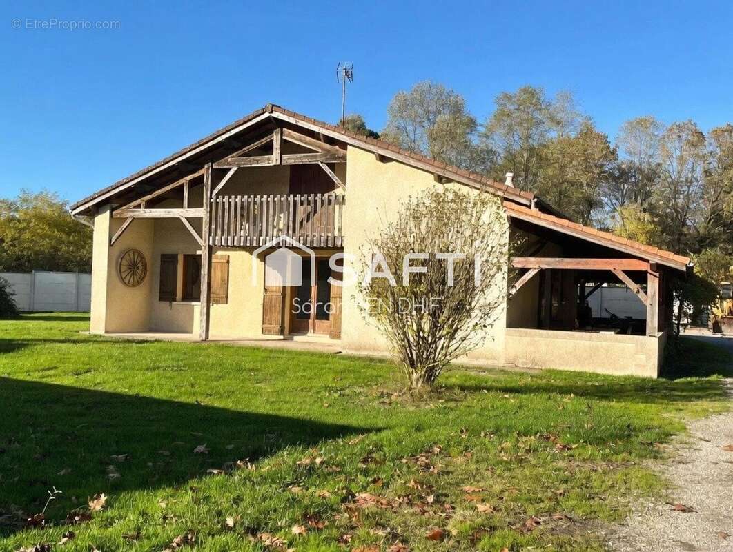 Photo 2 - Maison à LE TUZAN