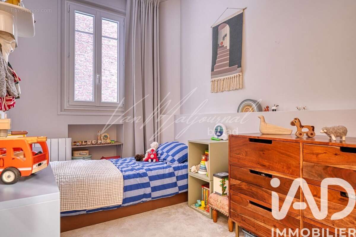 Photo 7 - Appartement à COURBEVOIE