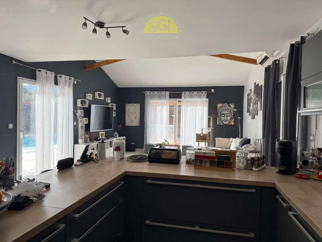 Maison à SAINT-GENIS-DES-FONTAINES