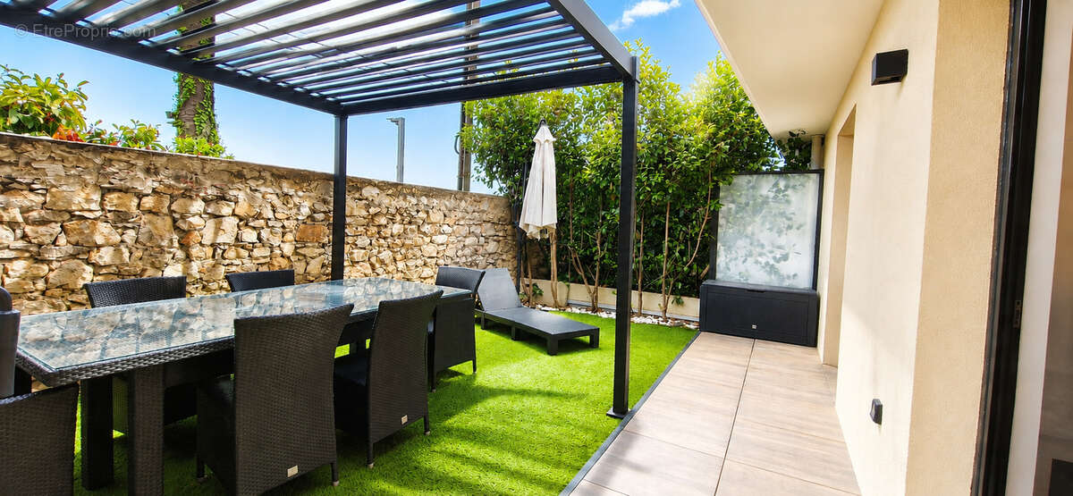 EXCLUSIVITE - Grand 2 pièces en rez de jardin + garage - photo 7