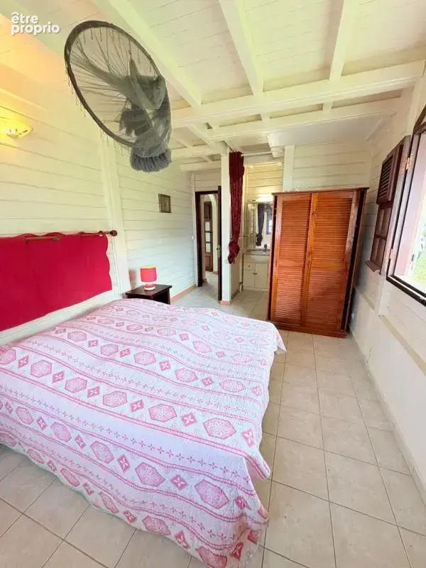 Magnifique maison créole F4 en bois rouge à 2 minutes de la mer - photo 7