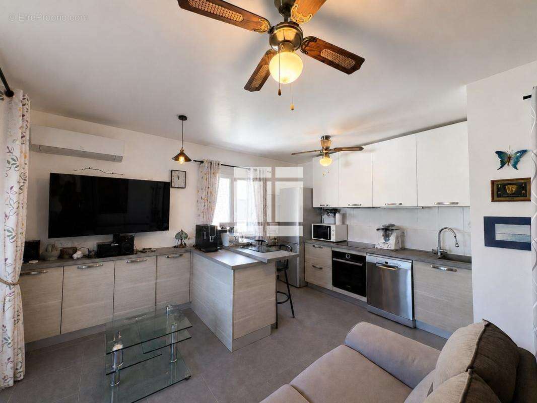 Appartement T2 à vendre avec terrasse, local privatif et place de parking - photo 2
